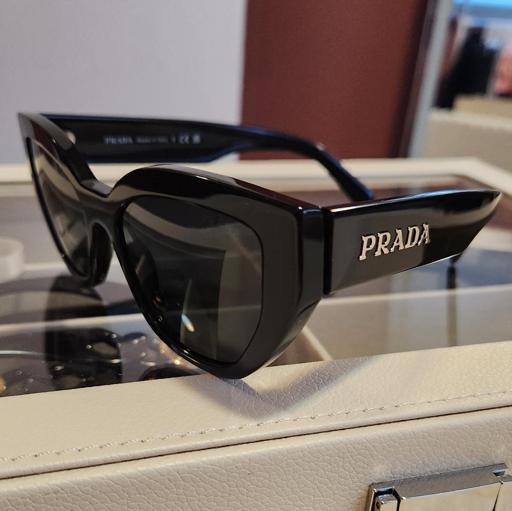 Prada Black Cat-Eye Sunglasses with Silver Logo